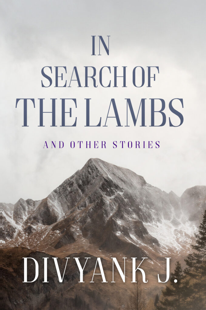 Cover of the book In Search of the Lambs and Other Stories, written by Divyank J. Cover image is a dark gray mountain, top half of photo is a light gray cloudy sky above the mountain.